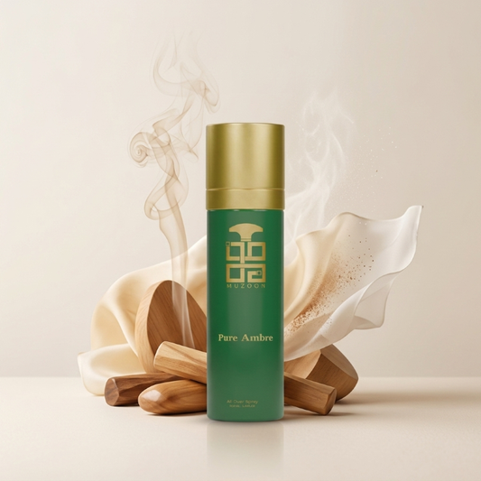 Green and gold bottle labeled 'Pure Ambre' with decorative elements on a light background