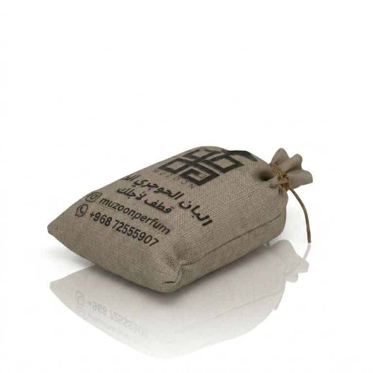 Luban Hojari Textured pouch with branding and contact information on a white background
