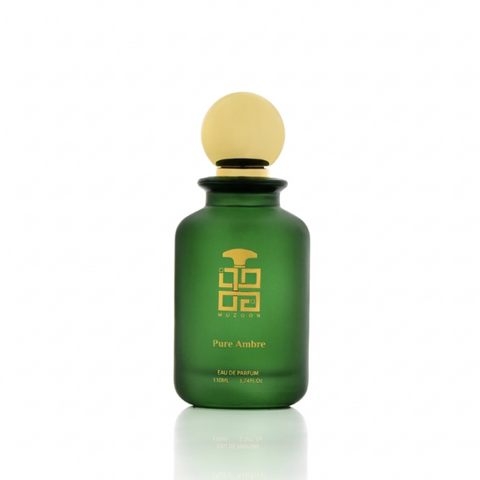 Pure Amber EDP by Muzoon Perfume Green bottle with gold cap on a white background