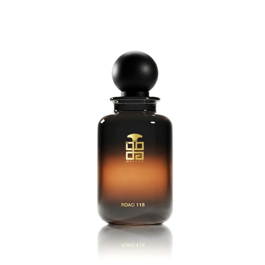 Road 118 EPD Muzoon Perfume Brown perfume gradient and black bottle with black cap on a white background
