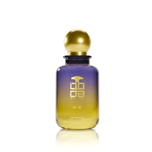 Turath EDP Muzoon Perfume bottle with gradient design of purple and gold color with a gold cap on a white background