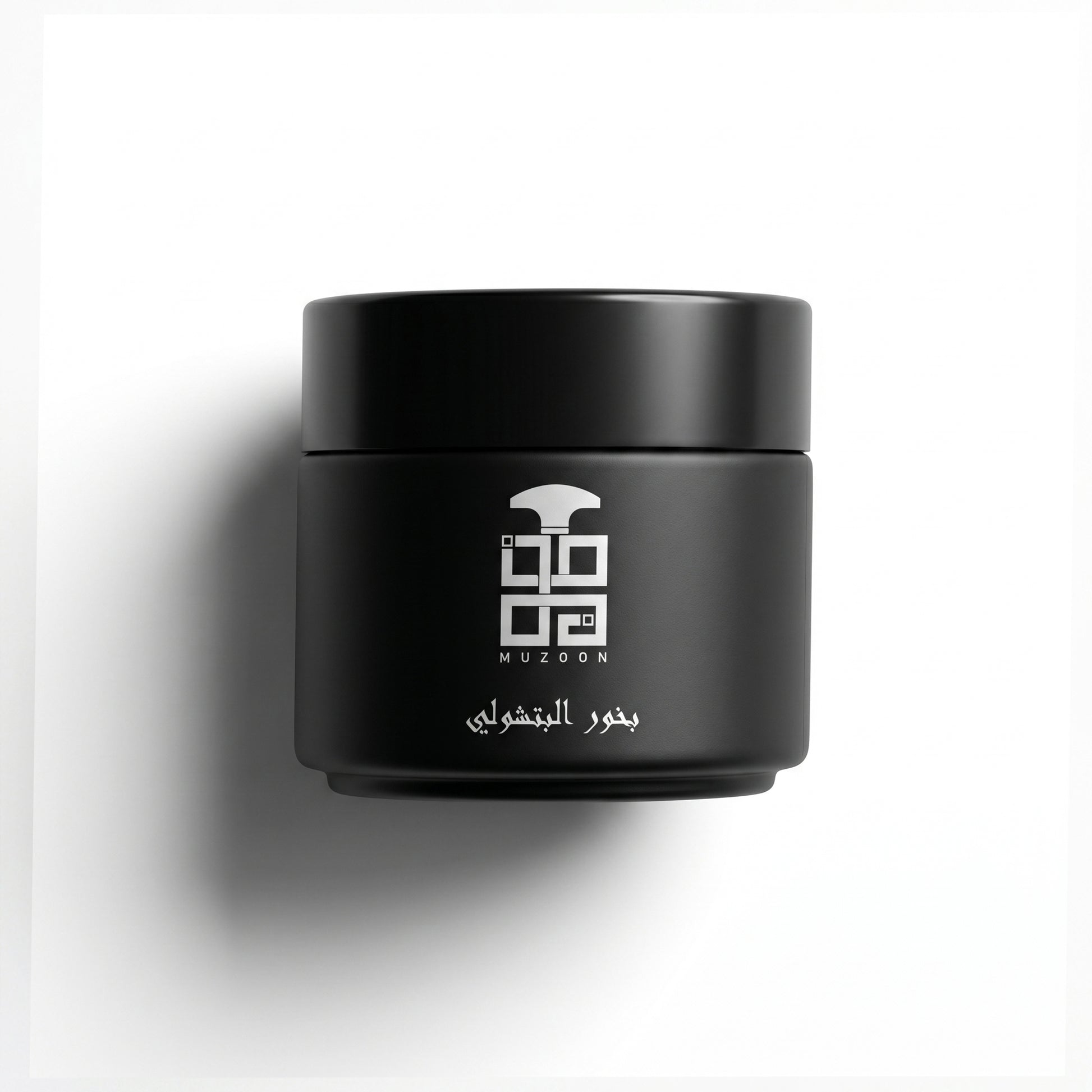 Patchouli Bukhour by Muzoon ��������� large matte black arabic incense jar with silver branding | Oud In