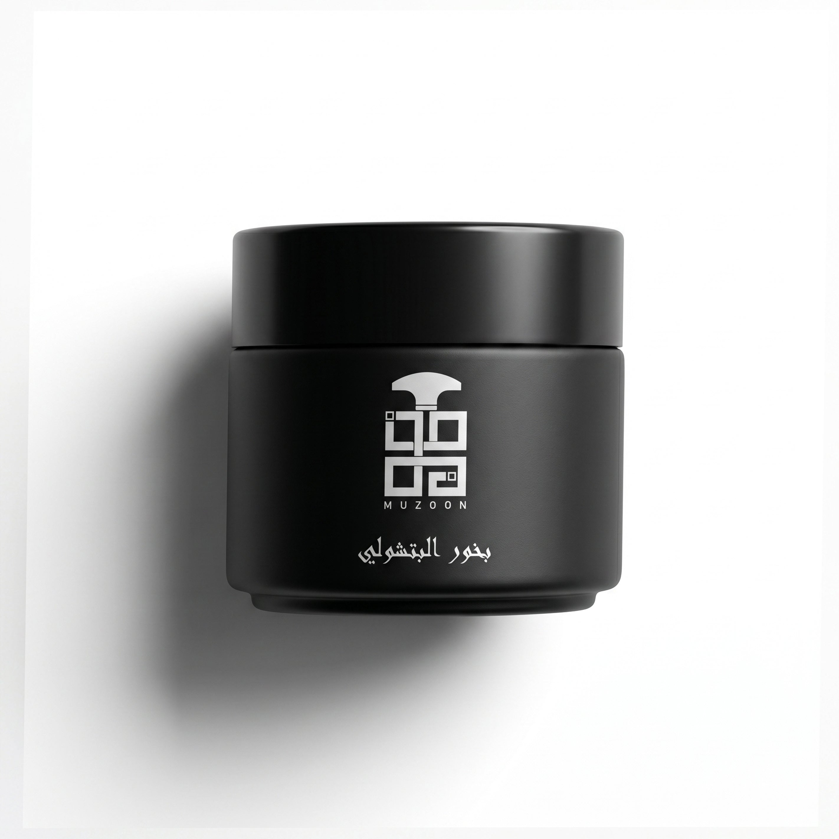 Patchouli Bukhour by Muzoon ��������� large matte black arabic incense jar with silver branding | Oud In