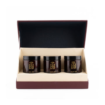 Luban Collection Gift Box by Muzoon ��������� open burgundy box with three amber bukhoor jars inside | Arabic Inc